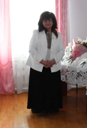 померла