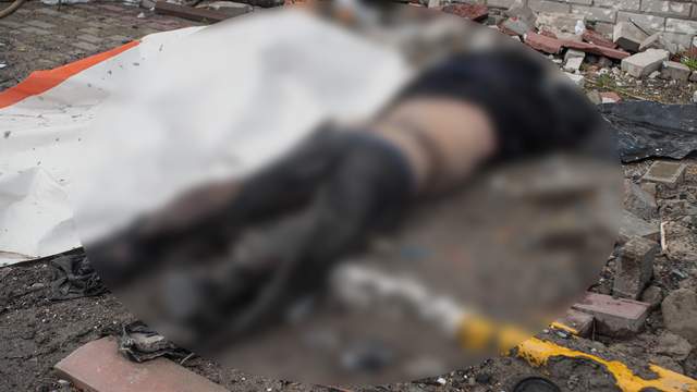 фоторепортаж з Київщини,Братські могили та зруйновані будинки,війна в україні