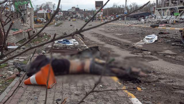фоторепортаж з Київщини,Братські могили та зруйновані будинки,війна в україні