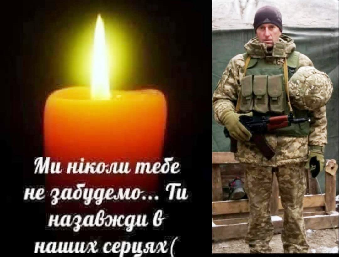 Свічка та військовий у камуфляжі, пам'ять герою.