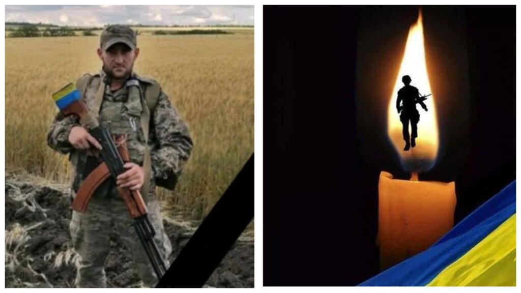 Український військовий з автоматом на полі.