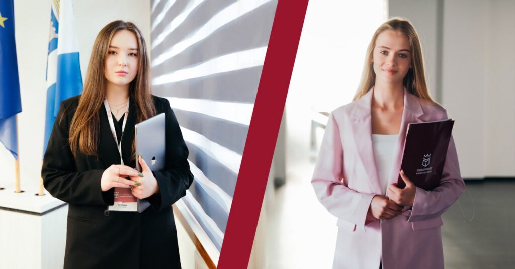 Дві жінки в ділових костюмах з документацією.