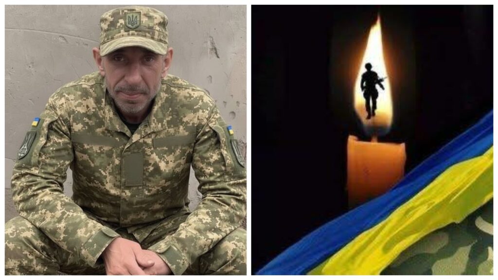 Український військовий поруч зі свічкою пам'яті.