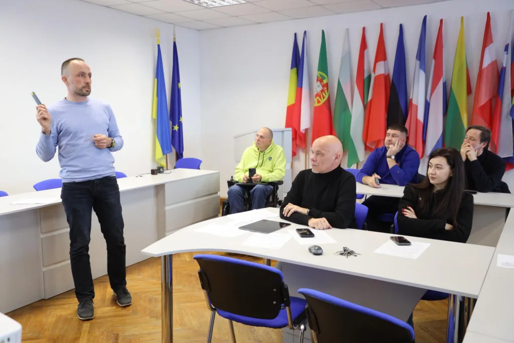Презентація у класі з міжнародними прапорами