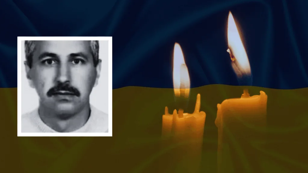 Світлина чоловіка та свічки пам’яті України