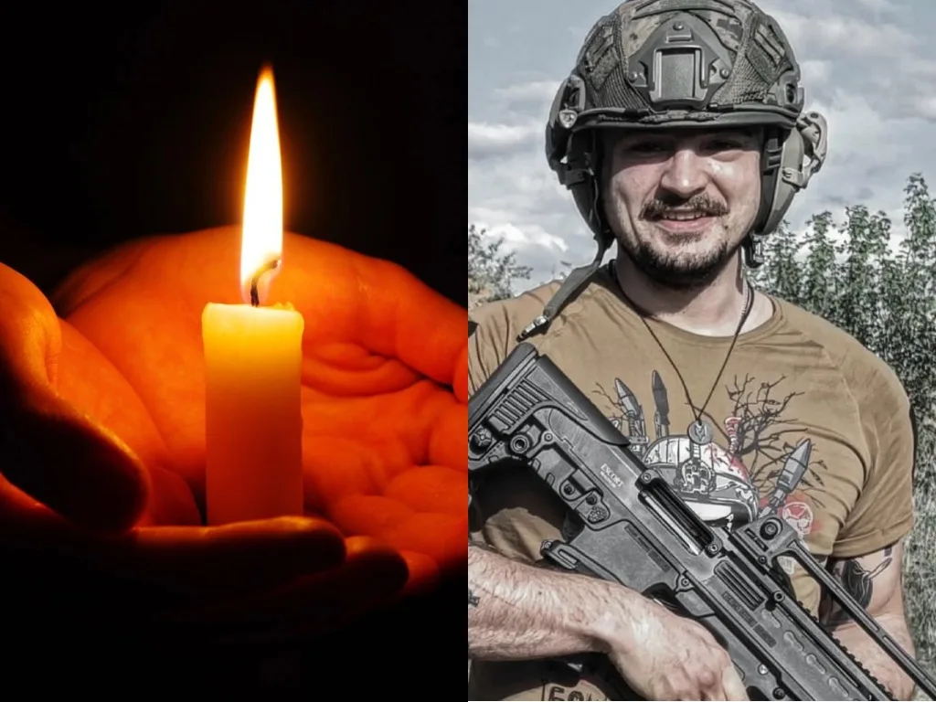 Свічка пам’яті та український військовий із зброєю