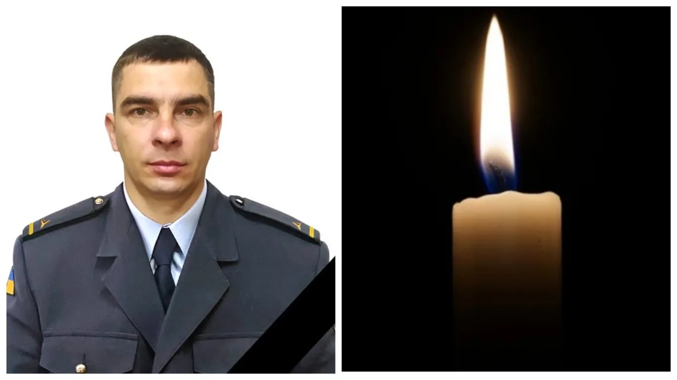 Військовий у формі та палаюча свічка пам’яті