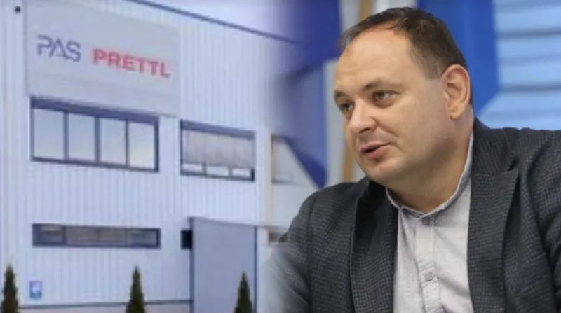 Чоловік перед будівлею компанії PRETTL