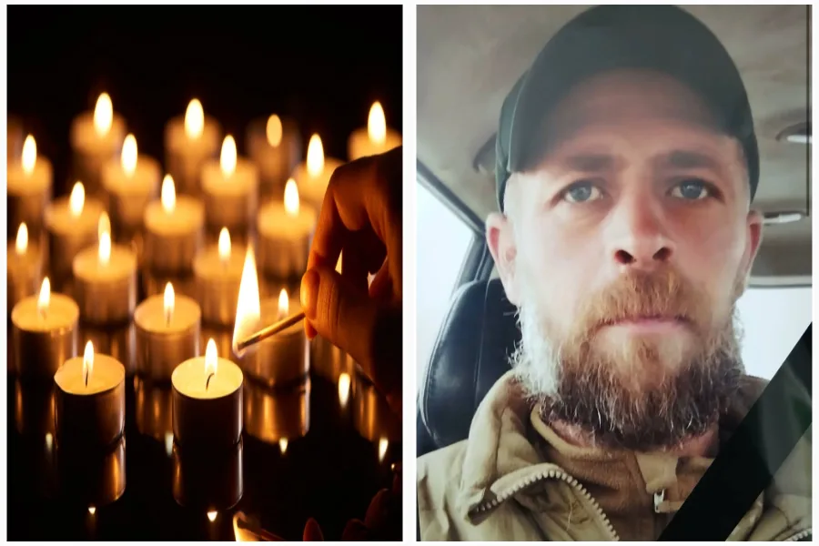 Пам’ятні свічки та чоловік у військовій формі