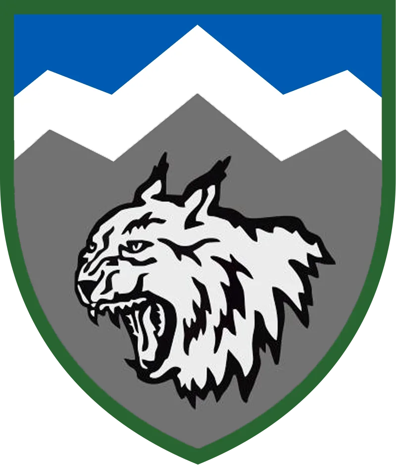 Герб із головою рисі на сірому тлі