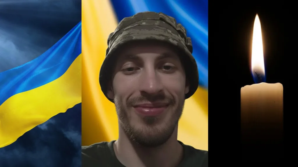 Український військовий, прапор України та свічка пам’яті