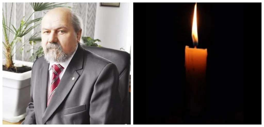 Чоловік у костюмі та запалена свічка