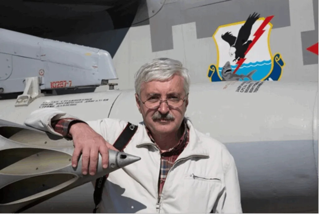 Чоловік біля військового літака