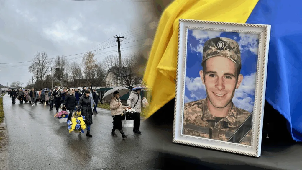 Похорон українського військового героя з квітами та прапором