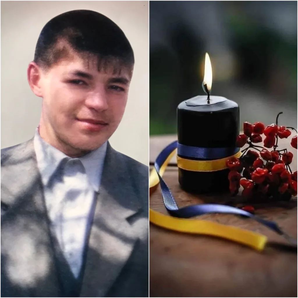 Портрет чоловіка та свічка пам’яті з калиновими ягодами