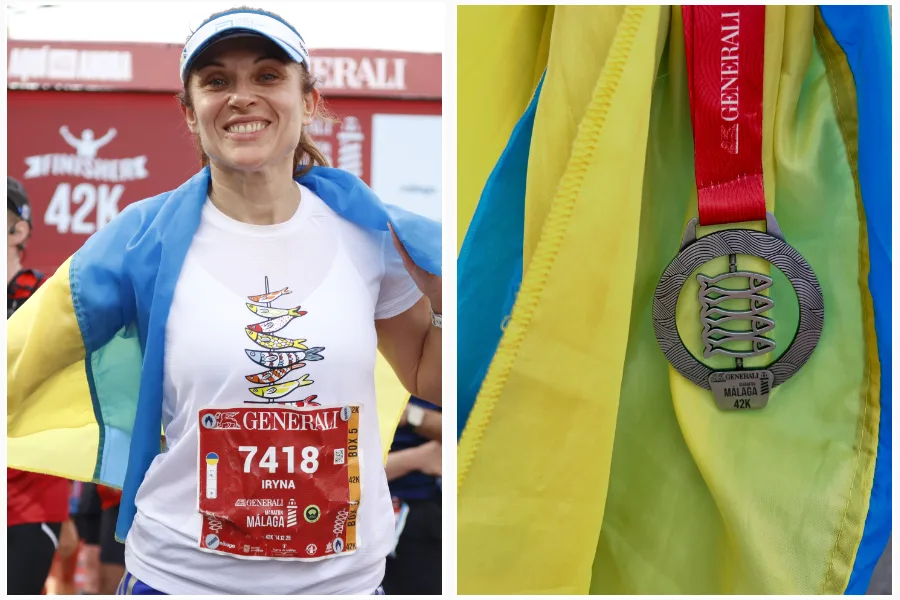Марафонка з українським прапором і медаллю Малага 42К