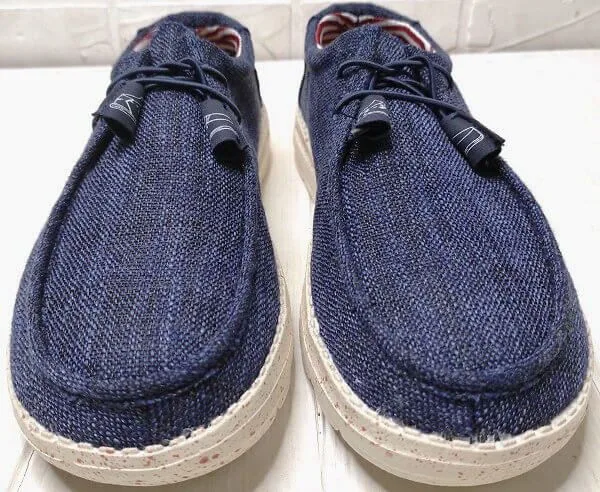 Темно-сині чоловічі тканинні мокасини на білій підошві