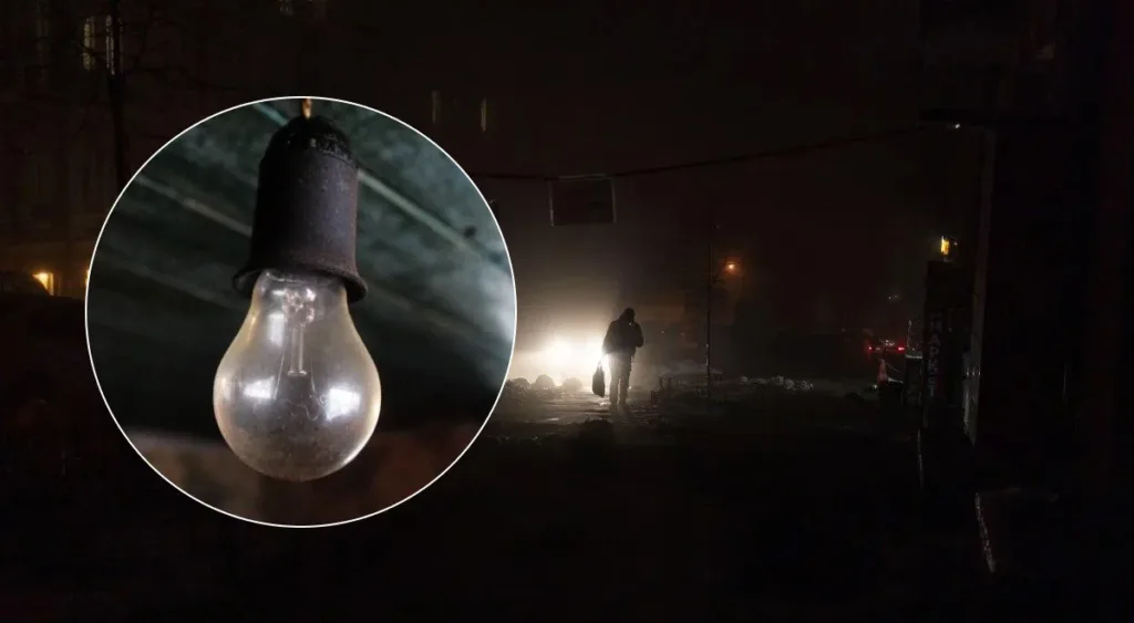 Темна вулиця та вимкнена лампочка під час відключення світла