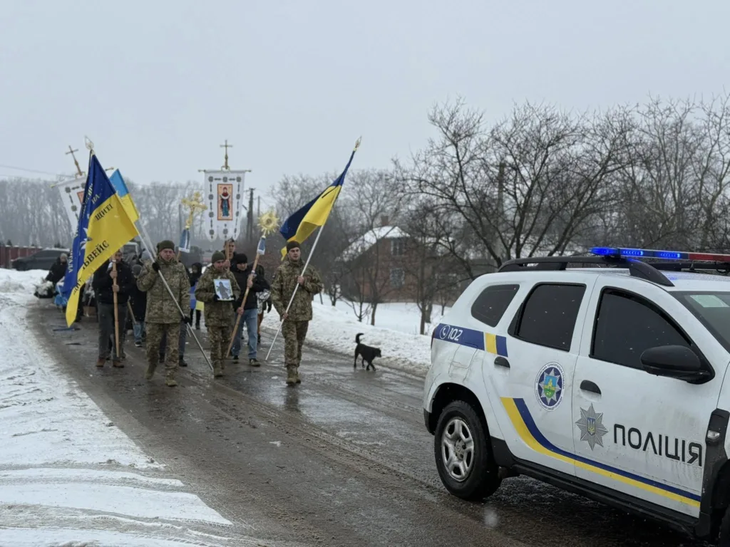 Військовий марш із прапорами України взимку