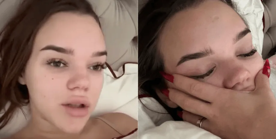 Дівчина лежить у ліжку та відпочиває