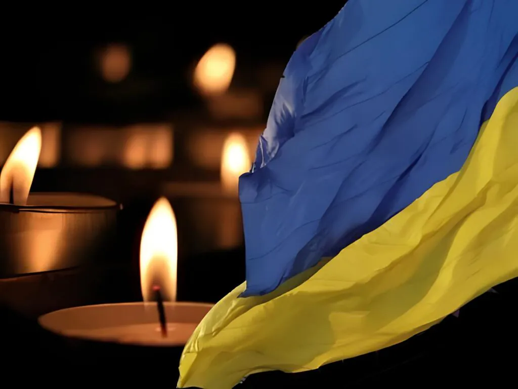 Український прапор і свічки пам’яті