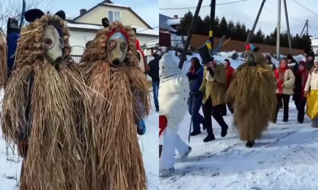 Зимовий фестиваль з людьми у солом'яних костюмах