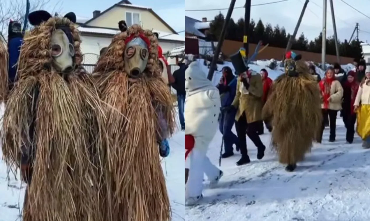 Зимовий фестиваль з людьми у солом'яних костюмах