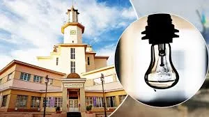 Будівля міської ради та зображення лампочки