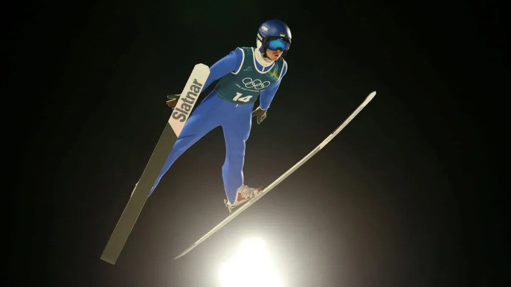 Стрибок лижника з трампліна вночі