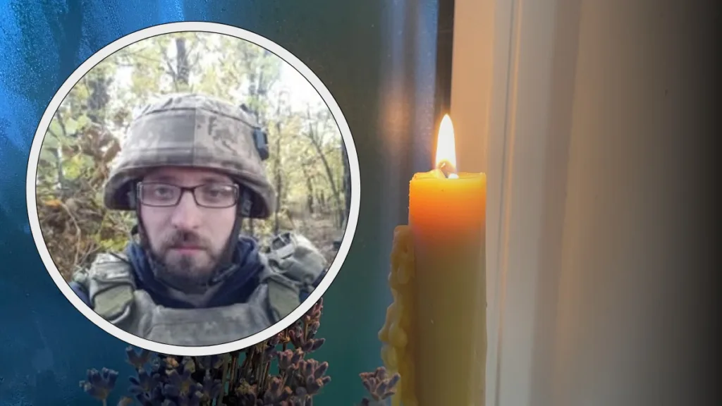 Український військовий та запалена пам’ятна свічка