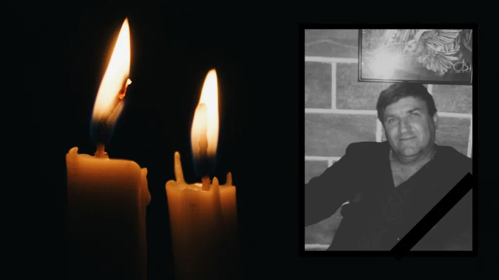 Свічки та чорно-біле фото на згадку