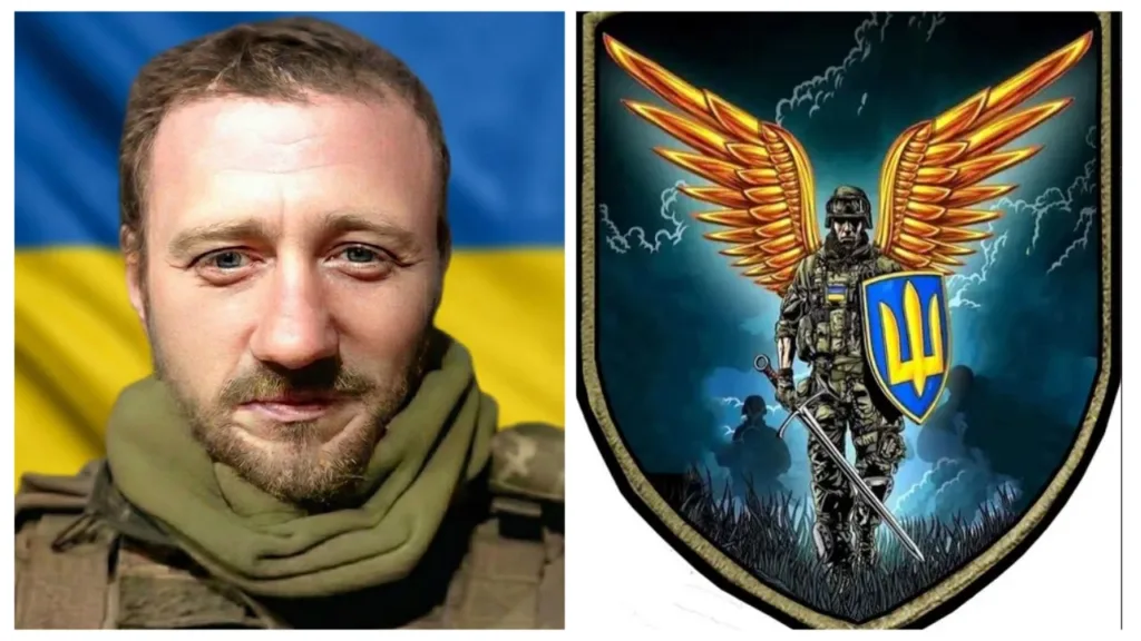 Український військовий і герб з крилами