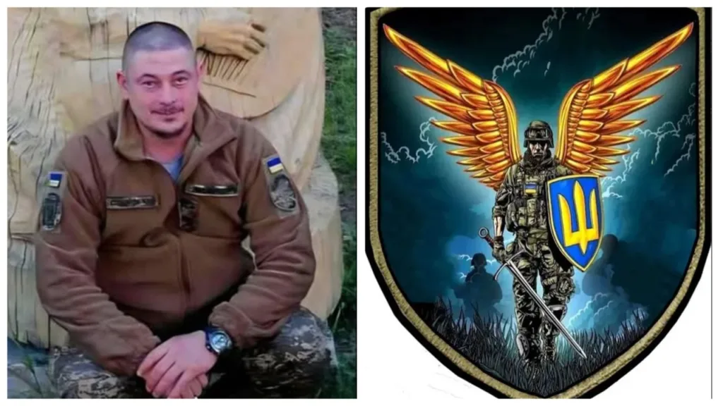 Український військовий поруч із символом Збройних сил