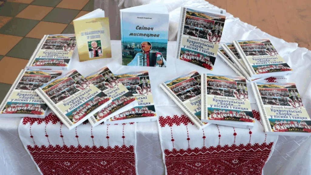 Книги про мистецтво і танці на вишитому столі