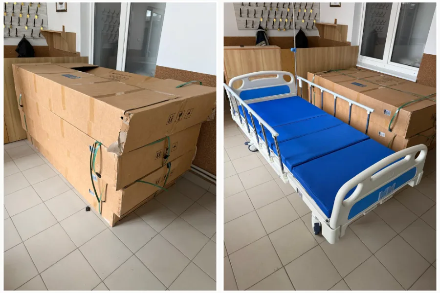 Медичне ліжко поруч із упакованими коробками