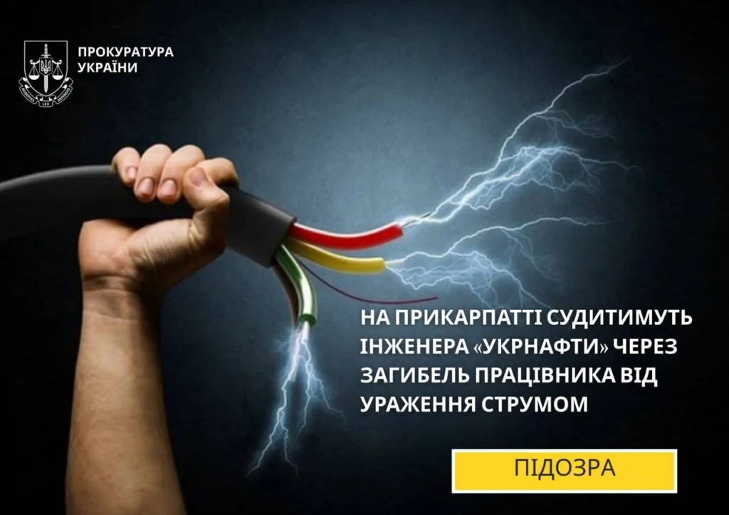 Електричний кабель із іскрами в руці людини