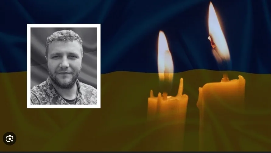 Пам'ять загиблого воїна, свічки та прапор України