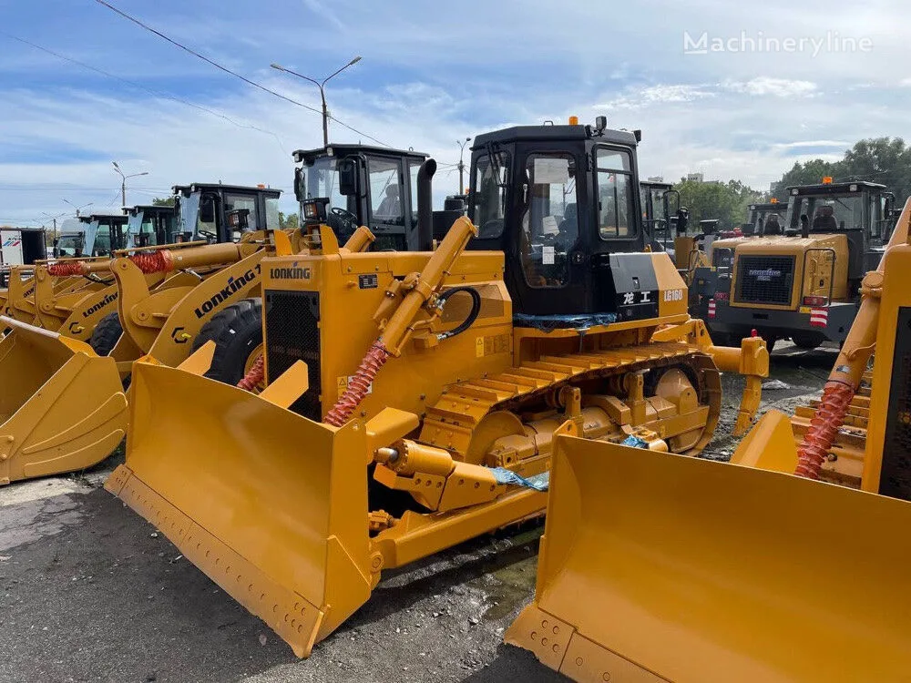 Жовтий бульдозер Lonking на будівельному майданчику