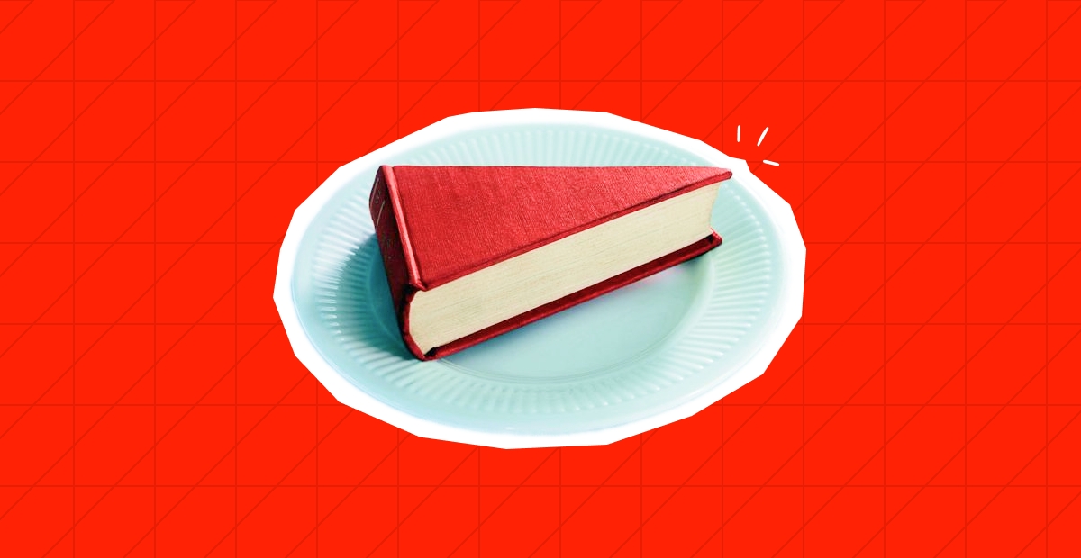 Червона книга у формі шматка торта на тарілці