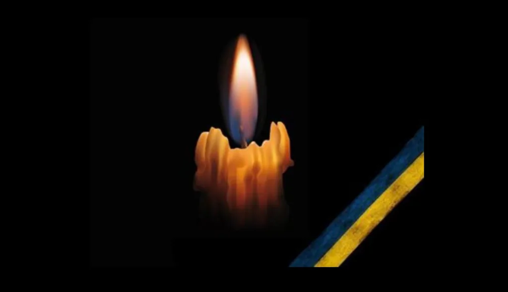 Свічка пам’яті з українською стрічкою