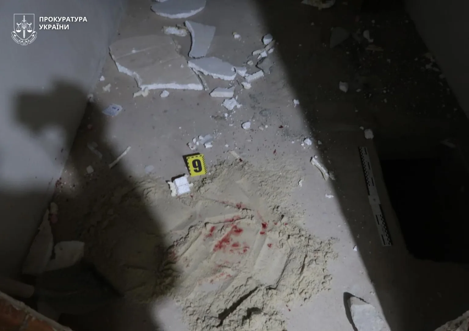 Місце злочину з доказами та міткою номер дев'ять
