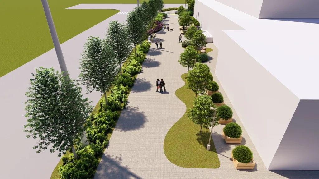 Зелена пішохідна алея біля сучасної будівлі