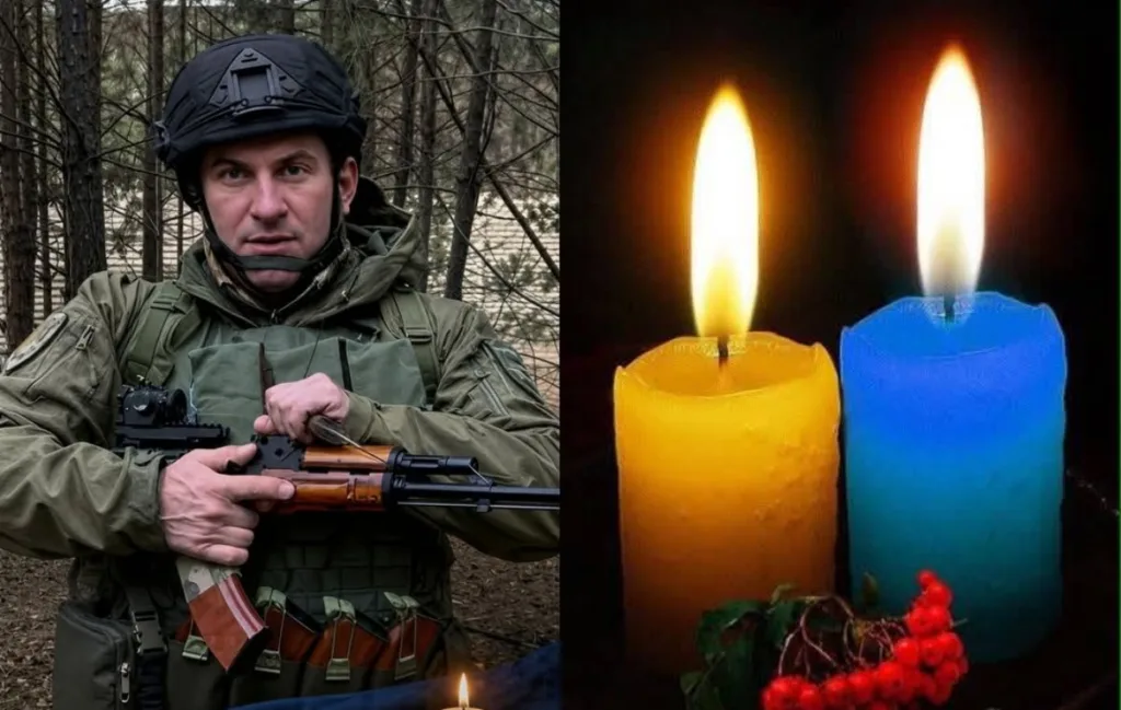 Український військовий і свічки пам’яті у національних кольорах