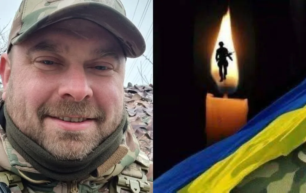 Український військовий та свічка пам’яті з прапором