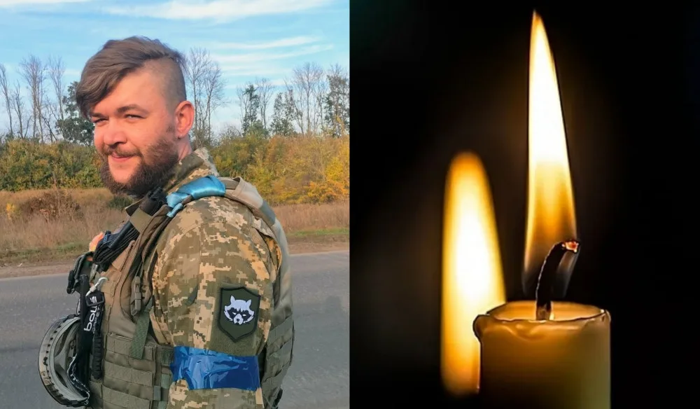 Військовий у формі та палаюча свічка