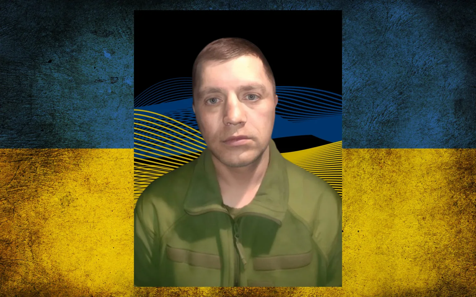 Військовий на тлі прапора України