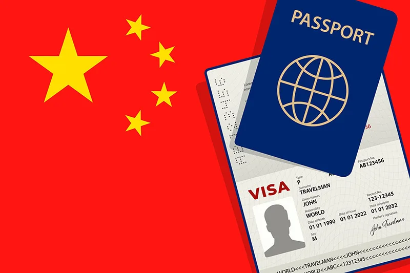 Китайська віза і паспорт на червоному тлі