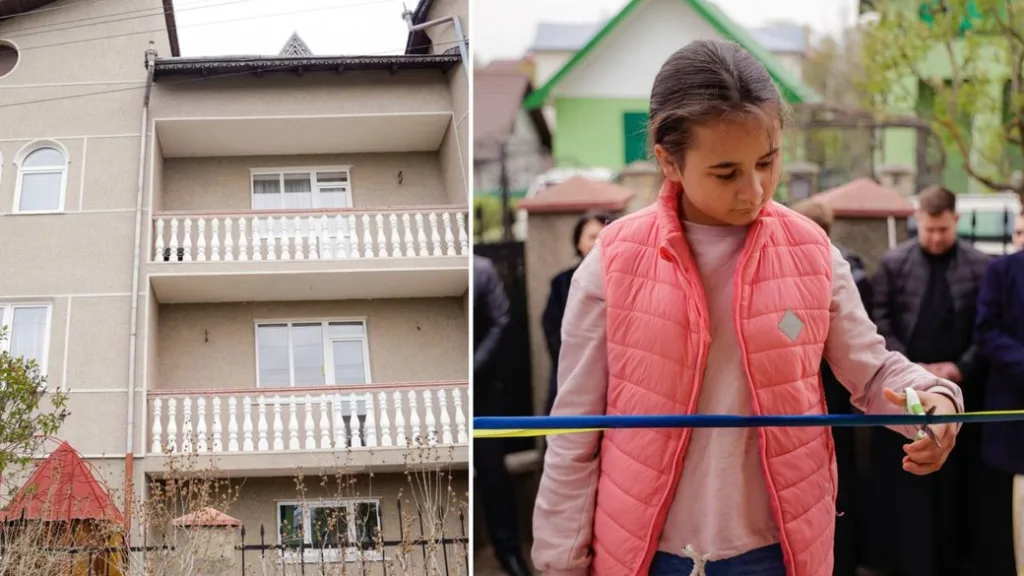 Дівчинка відкриває новий будинок, перерізаючи стрічку