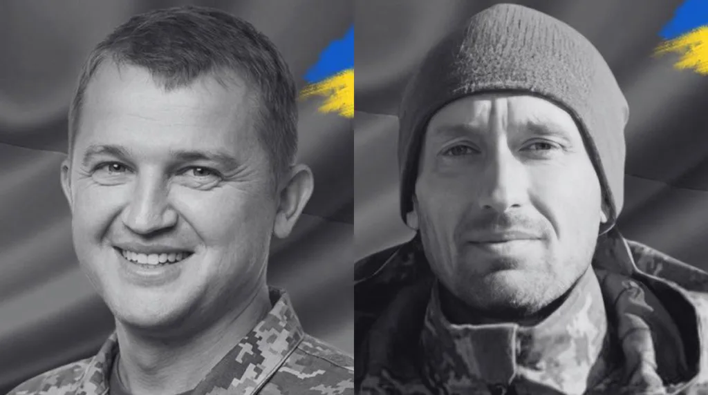 Українські військові на тлі прапора України