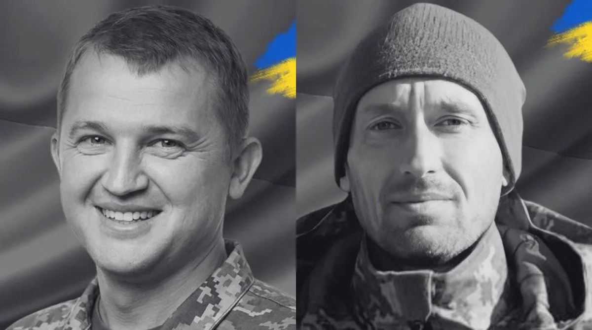 Українські військові на тлі прапора України